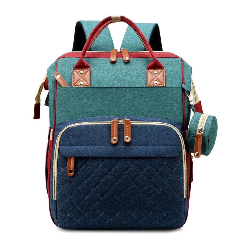 sac à dos à langer détail profil dorsik bleu vert