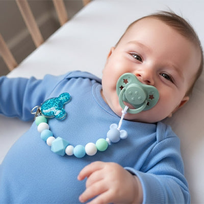 attache tetine silicone bébé heureux