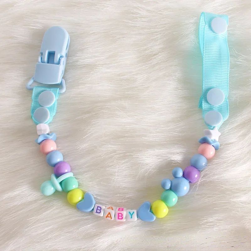 attache tetine silicone bleu