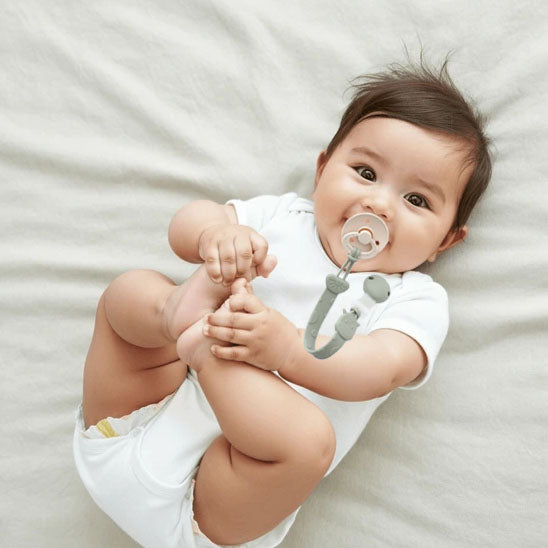 attache tetine silicone pratique pour bébé