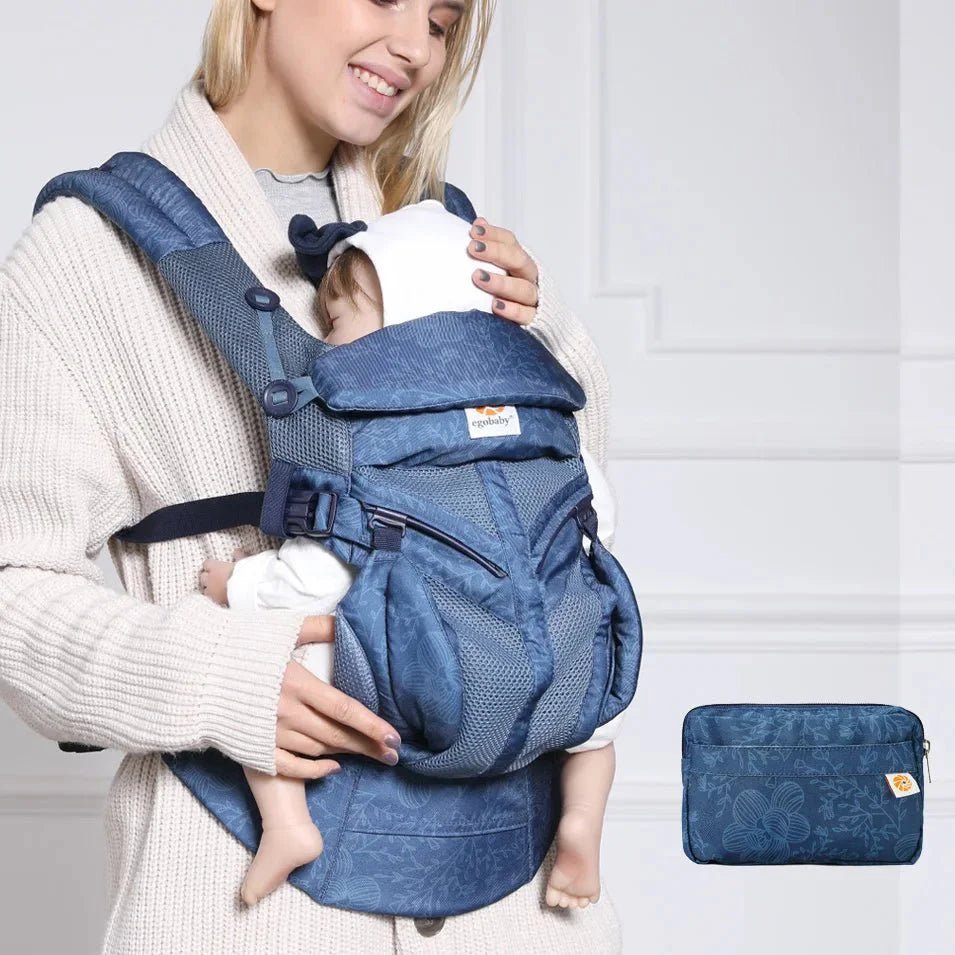 bébé endormi dans porte bébé breathbabybag bleuprint