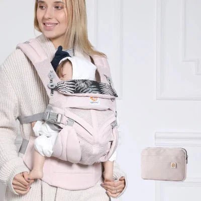 bébé endormi dans porte bébé breathbabybag rose maille 