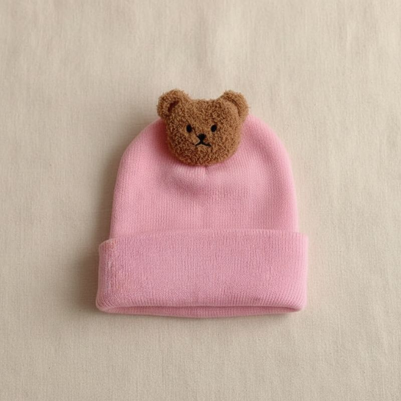 bonnet pour bebe rose avec design ours