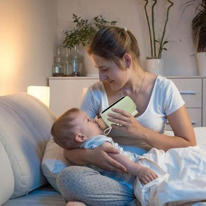 chauffe-biberon portable lait en balade famille heureuse