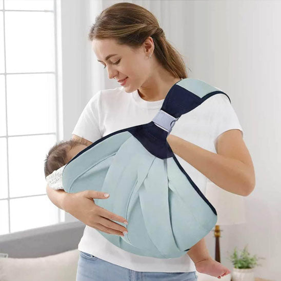 portage en écharpe bulle de calme vert maman nourrissant bébé