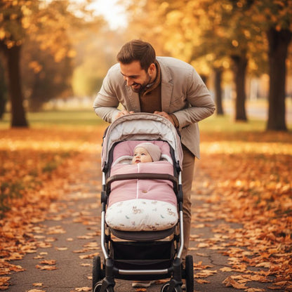 promenade papa bébé dans chanceliere pour poussette rose