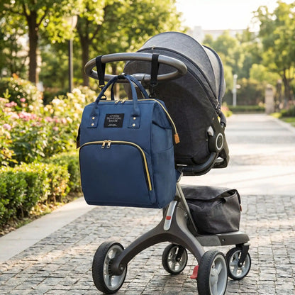 sac à dos à langer adapté aux poussettes movea marin