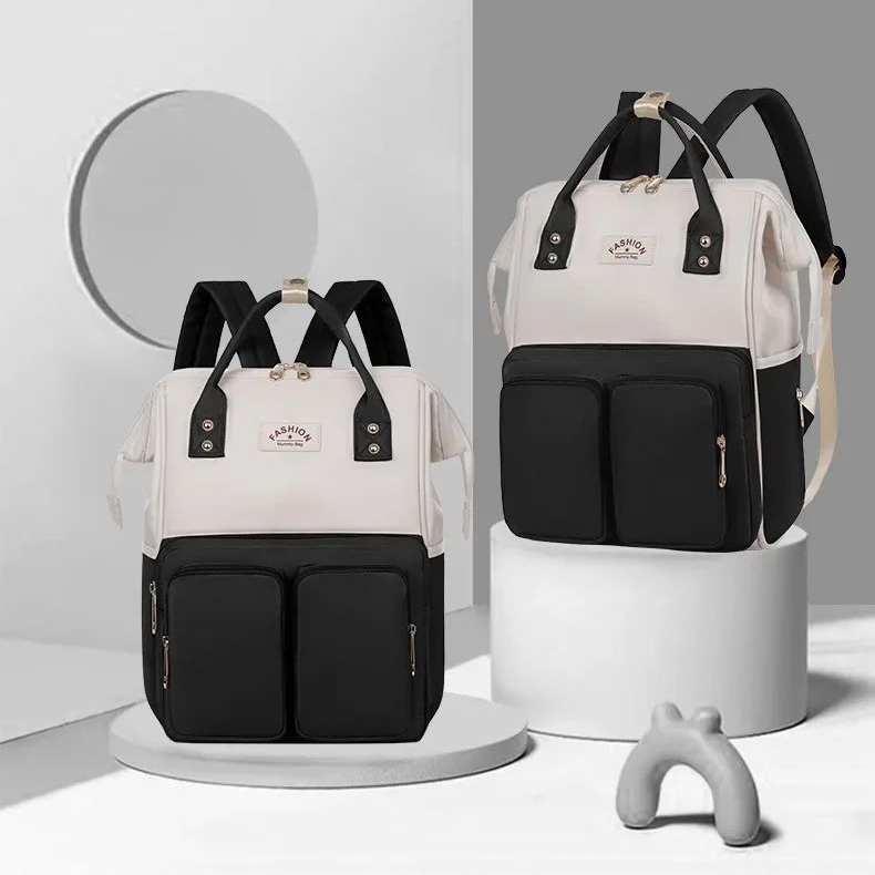 sac à dos à langer exposition sur socle avec poignées et bretelles mamaluxe noir