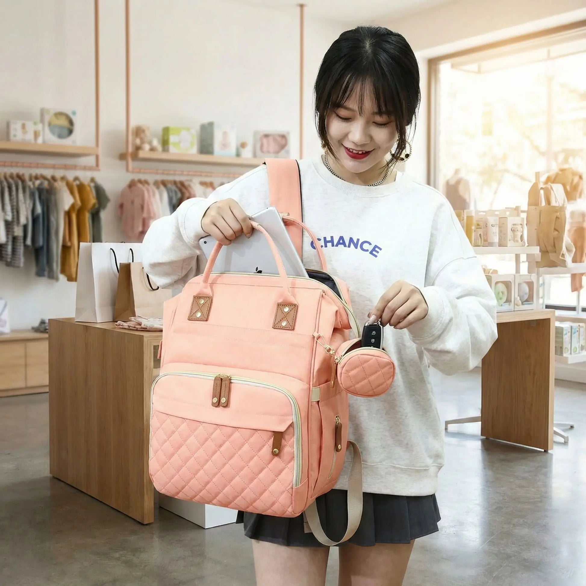 sac à dos à langer usage maman dorsik rose