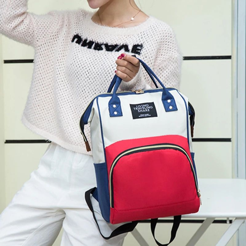 sac à dos à langer utilité voyage movea bicolore