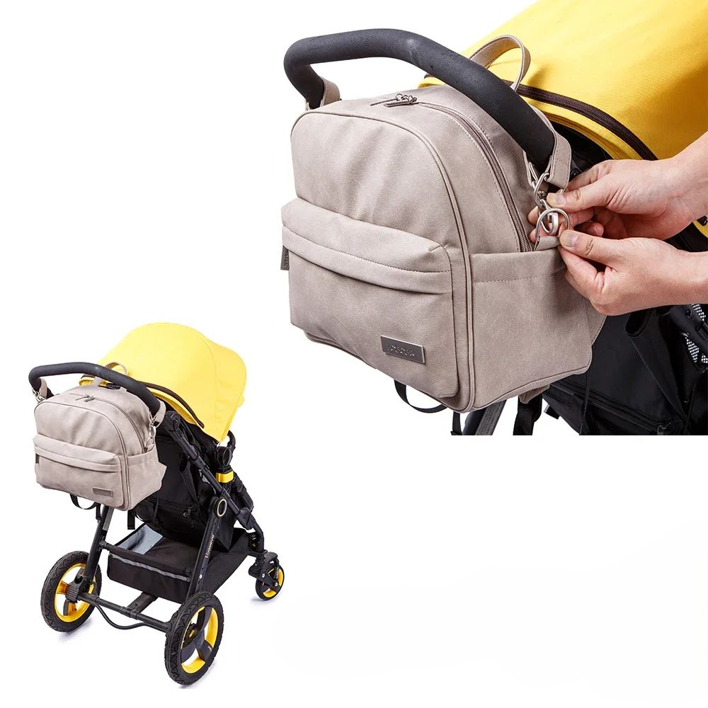 sac à langer à dos fixation poussette pratique ruth kaki
