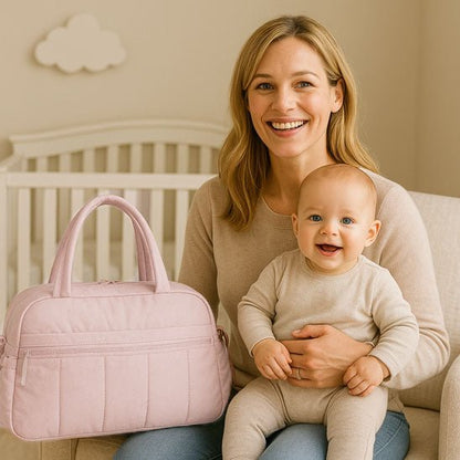 sac a langer rose pâle maman bébé souriant